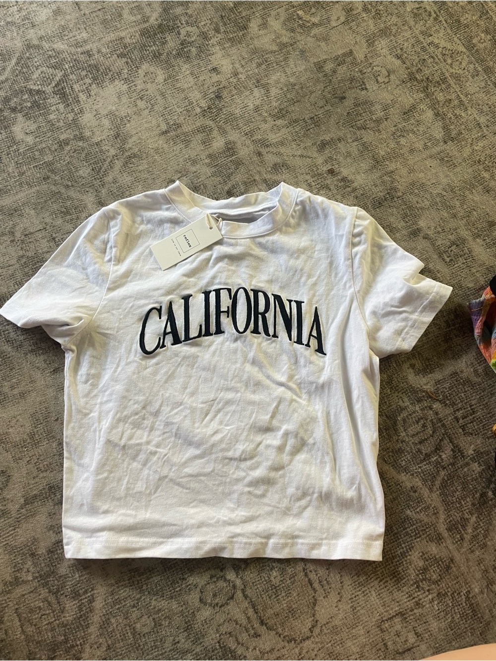 Reflex White Short-Sleeve Tee with Black "CALIFORNIA" Arch